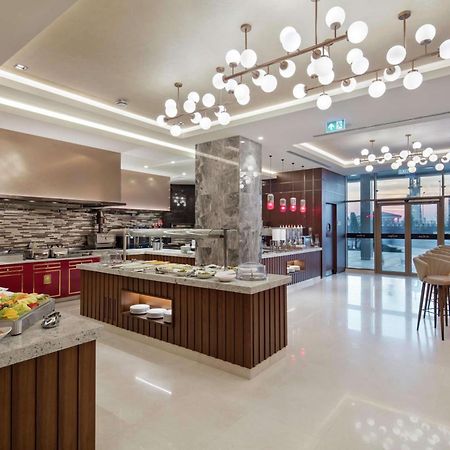 Doubletree By Hilton Skopje Exterior foto The Kitchen Table
